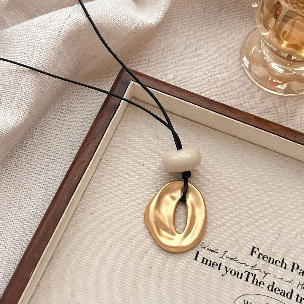 Irregular matte openwork oval pendant long necklace