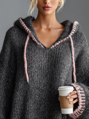 Loose-fitting hooded pink-trimmed knitted mini dress